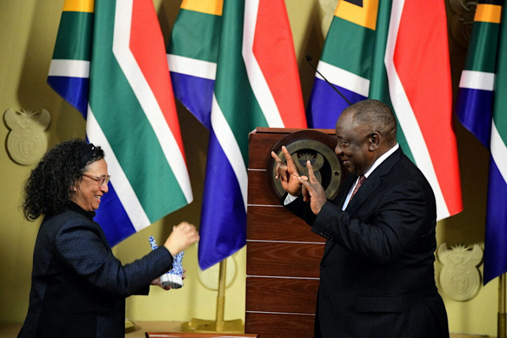 South African President Cyril Ramaphosa gestures in sign language after he signed legislation into law last month recognising sign as the country's 12th official language, alongside English, Zulu, Afrikaans and others, to help protect the rights of the deaf and promote inclusivity in Pretoria, South Africa, on 19th July, 2023.