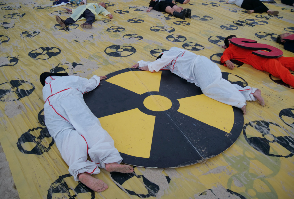 Activists take part in a protest against Japan releasing treated radioactive water from the wrecked Fukushima nuclear power plant into the Pacific Ocean, in Busan, South Korea, on 24th August, 2023