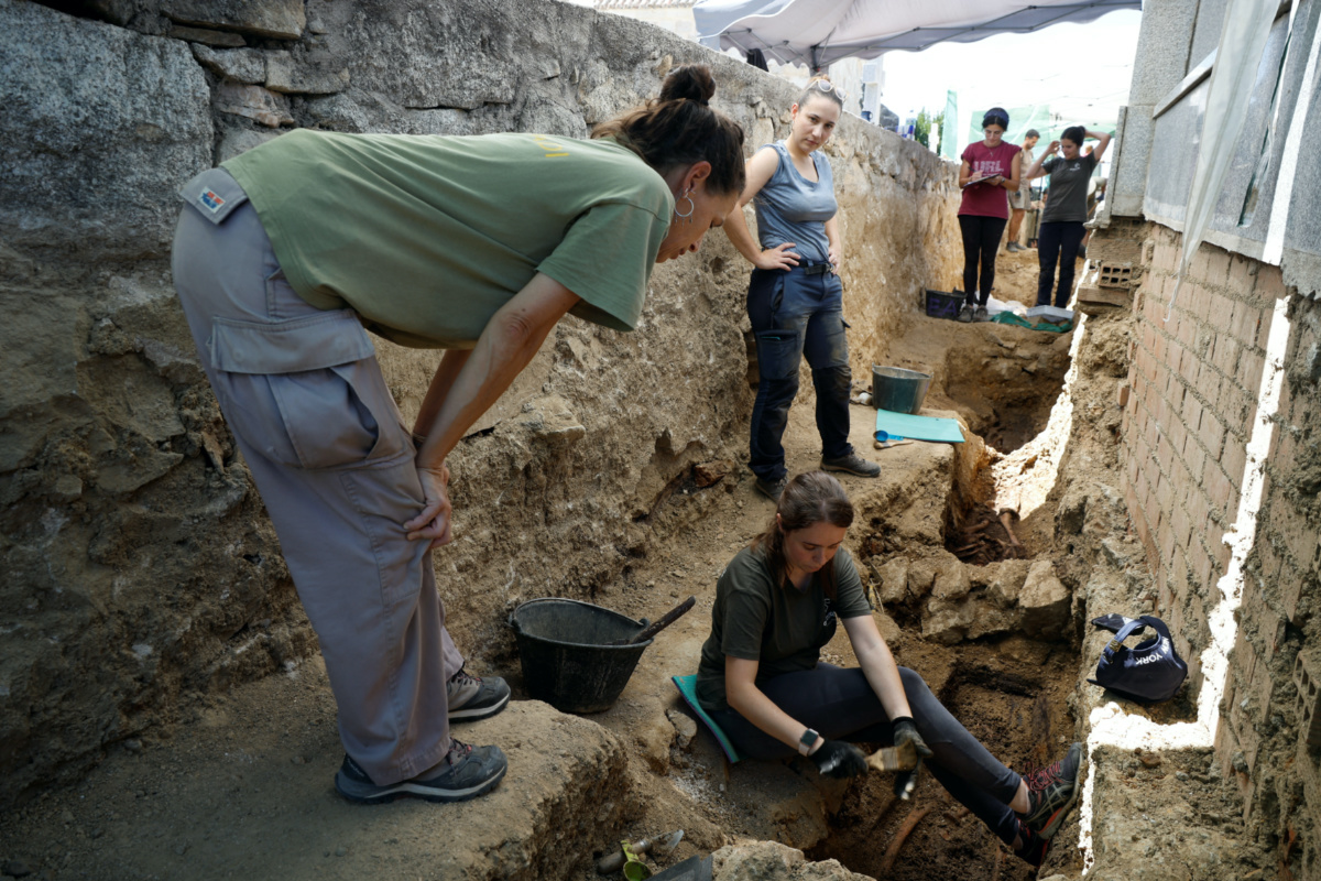 Members of the Aranzadi Science Society take part in the exhumation of the people who were killed by the forces of dictator Francisco Franco in a mass grave in the Colmenar Viejo cemetery, Spain, on 10th August, 2023.