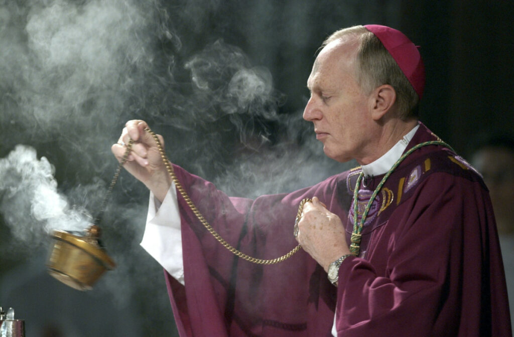 Bishop Howard Hubbard swings incense during an Ash Wednesday communion service at the Cathedral of the Immaculate Conception on 25th February, 2004, in Albany, New York