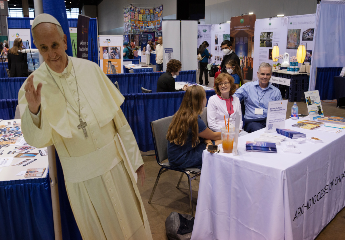 Representatives of the Archdiocese of Chicago in the exhibit hall of the Parliament of the World's Religions in downtown Chicago on 14th August, 2023.