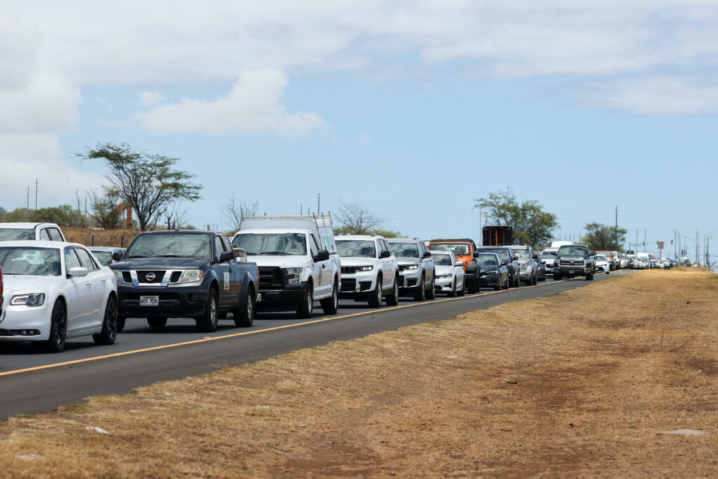 Vehicles are seen in traffic on Honoapiilani Hwy after officials allowed residents and tourists back into West Maui after a wildfire destroyed the historic town of Lahaina, in Maui, Hawaii, US, on 11th August, 2023