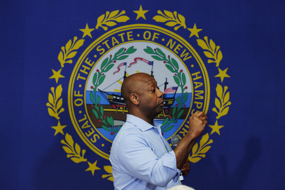 Republican presidential candidate US Senator Tim Scott speaks in front of a New Hampshire state flag at a campaign town hall meeting in Salem, New Hampshire, US, on 18th July, 2023