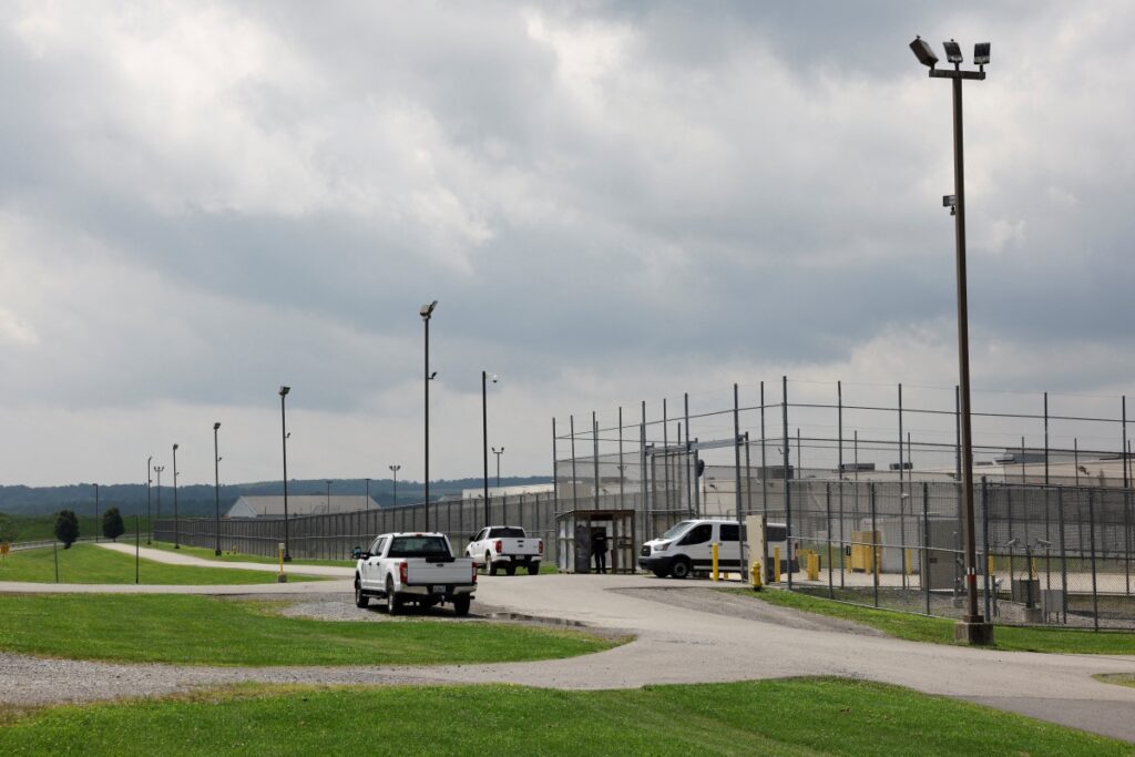 A detainee transport van exits the Moshannon Valley Processing Center, a former prison repurposed as an immigration detention facility operated by the GEO Group under contract with the U.S. Immigration and Customs Enforcement, in Philipsburg, Pennsylvania, US, on 27th July, 2023.