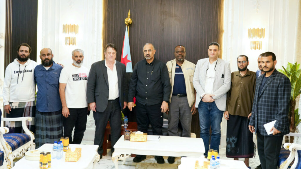 United Nations security staff, who have been released from the hands of al-Qaeda militants, stand with David Gressly, the United Nations Resident and Humanitarian Coordinator for Yemen and head of the Southern Transitional Council, Aidarous al-Zabidi, in Aden, Yemen, on 11th August, 2023.
