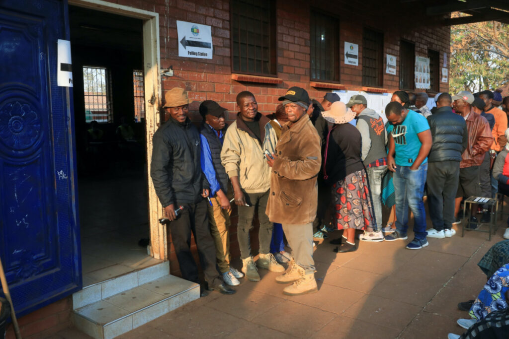 People queue to cast their vote in a general election at Kuwadzana school in Harare, Zimbabwe, on 23rd August, 2023