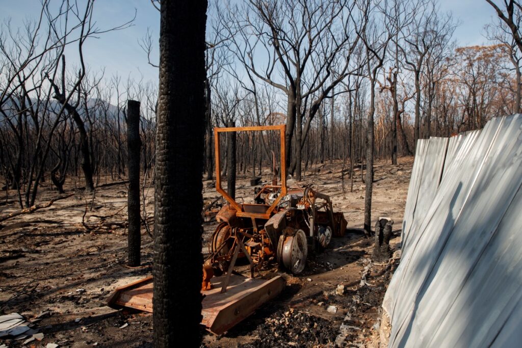 A burned tractor stands amid dead trees after a wildfire destroyed the Kangaroo Valley Bush Retreat in Kangaroo Valley, New South Wales, Australia, on 23rd January, 2020