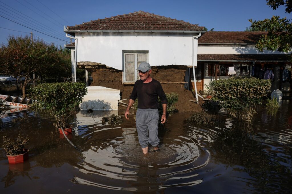 Dimos Tsiakas walks in the yard of his flooded house, in the aftermath of Storm Daniel in central Greece, in the village of Palamas, Greece, on 9th September, 2023