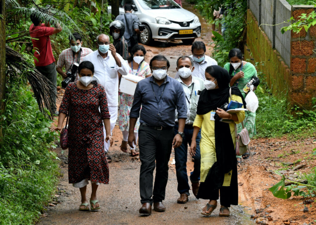 Members of a medical team from Kozhikode Medical College carry areca nut and guava fruit samples to conduct tests for Nipah virus in Maruthonkara village in Kozhikode district, Kerala, India, on 13th September, 2023