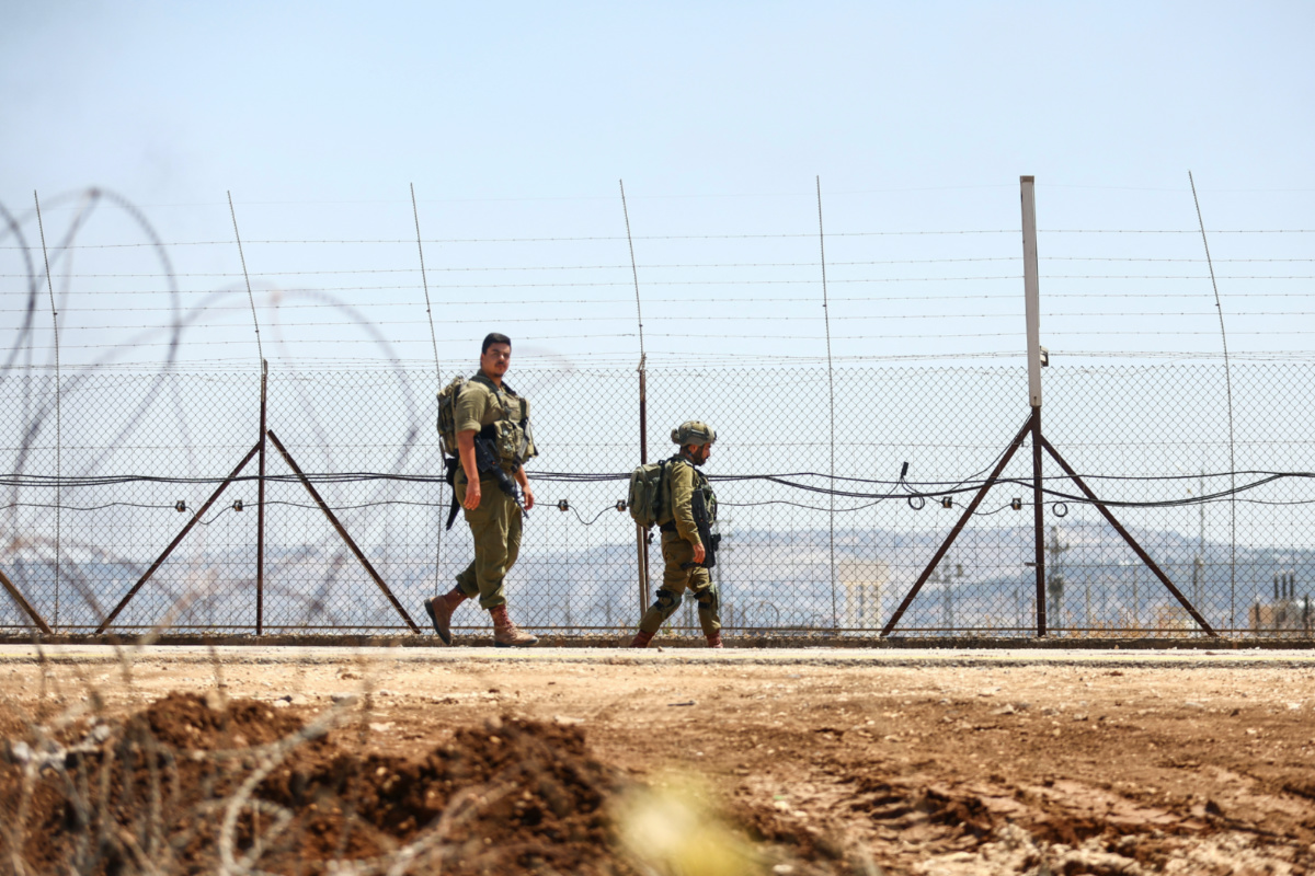 Israeli military patrol a border during a raid on Jenin refugee camp at Salem checkpoint, the entrance from Israel to Jenin in the Israeli-occupied West Bank, on 3rd July, 2023