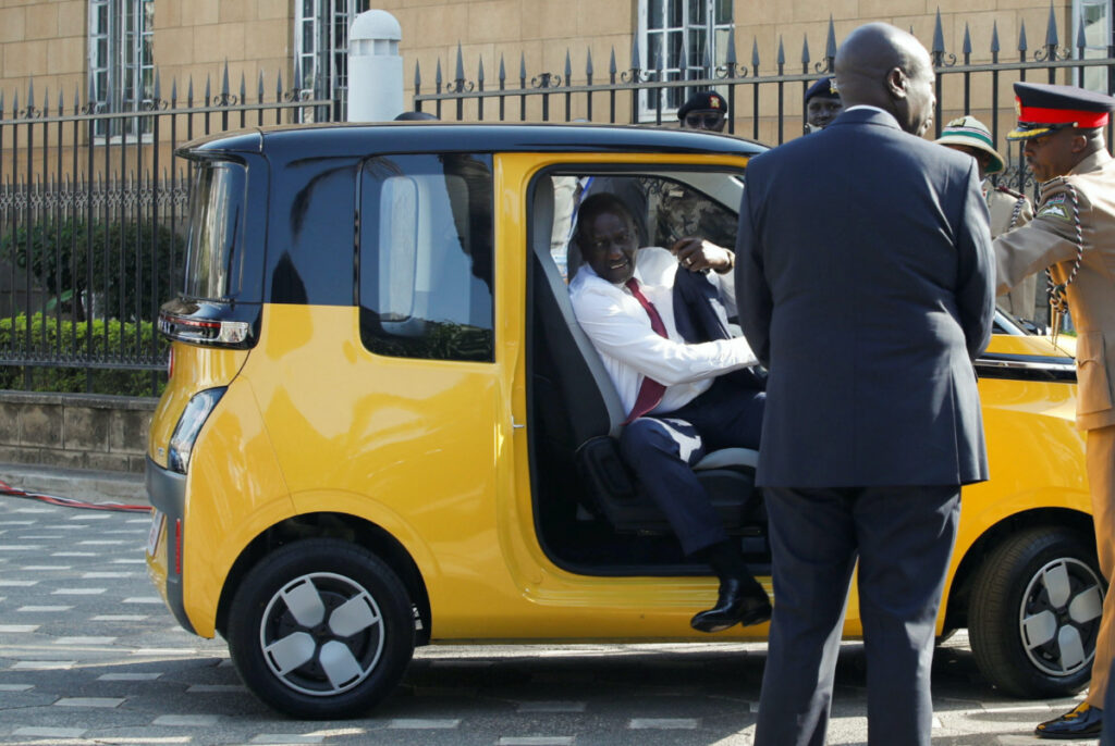 Kenya's President William Ruto alights from an Autopax Air Yetu electric car as he arrives for the Africa Climate Summit 2023 at the Kenyatta International Convention Centre in Nairobi, Kenya, on 6th September, 2023