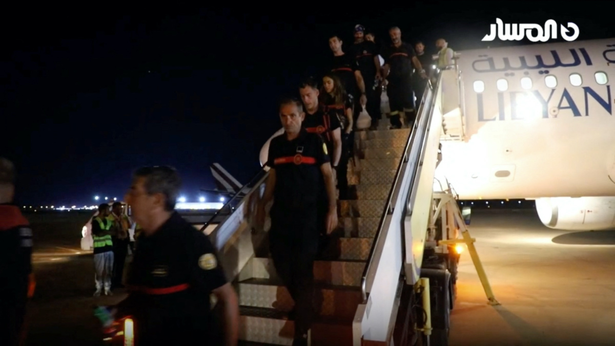 A Spanish emergency team arrives at Benina Airport to participate in the search and rescue operation after a powerful storm and heavy rainfall hit Libya, in Benghazi, Libya, on 14th September, 2023 in this still image from video obtained from social media