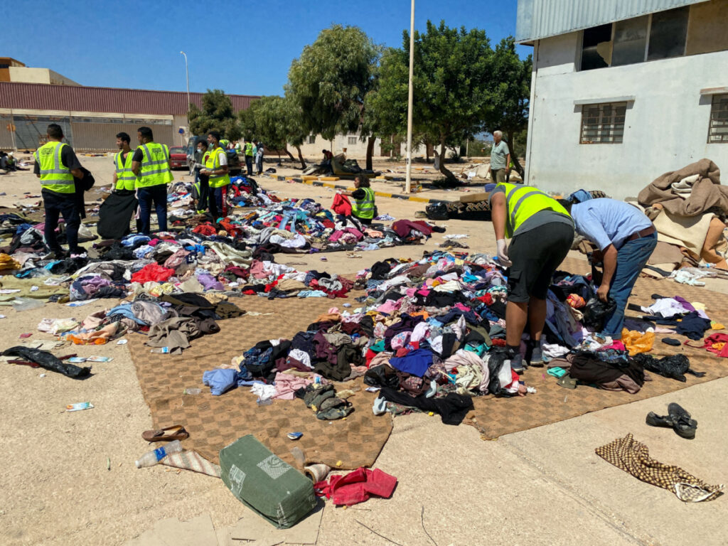 Volunteers from the Beltrees Youth Movement sort clothes that are to be distributed to the displaced people, in the aftermath of the floods in Derna, Libya, on 14th September, 2023.