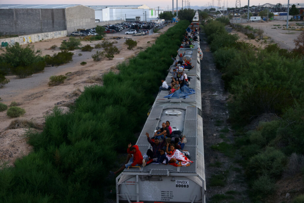 Migrants travel on a train, with the intention of reaching the United States, in Ciudad Juarez, Mexico, on 29th August, 2023
