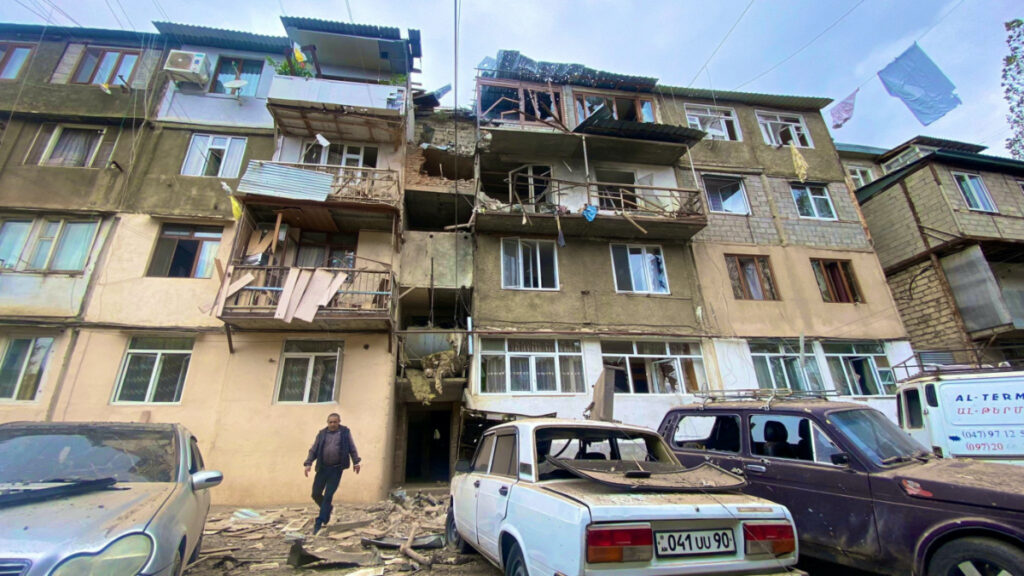 A view shows a damaged residential building and cars following the launch of a military operation by Azerbaijani armed forces in the city of Stepanakert in Nagorno-Karabakh, a region inhabited by ethnic Armenians, on 19th September, 2023.
