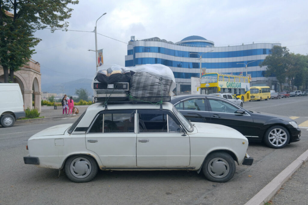 A view shows a car loaded with belongings of people leaving Nagorno-Karabakh, a region inhabited by ethnic Armenians, on a street in Stepanakert, on 25th September, 2023.