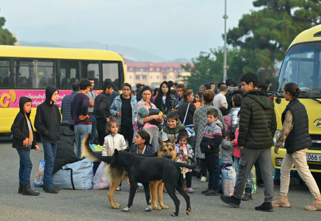 Residents gather next to buses in central Stepanakert before leaving Nagorno-Karabakh, a region inhabited by ethnic Armenians, on 25th September, 2023