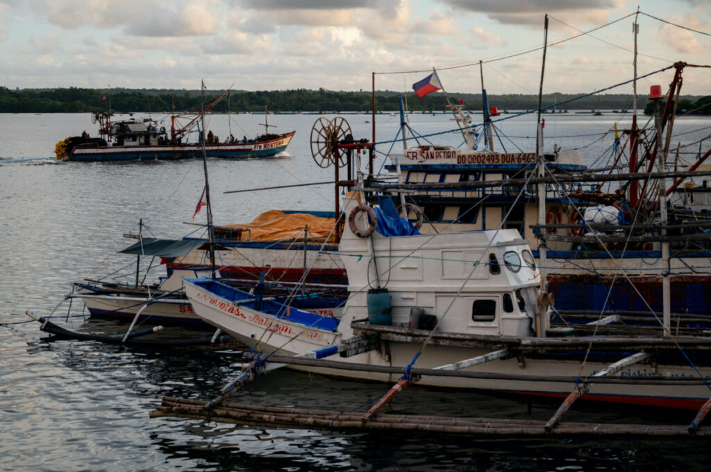 A fishing boat departs from a port in Masinloc, Zambales province, Philippines, on 26th September, 2023.