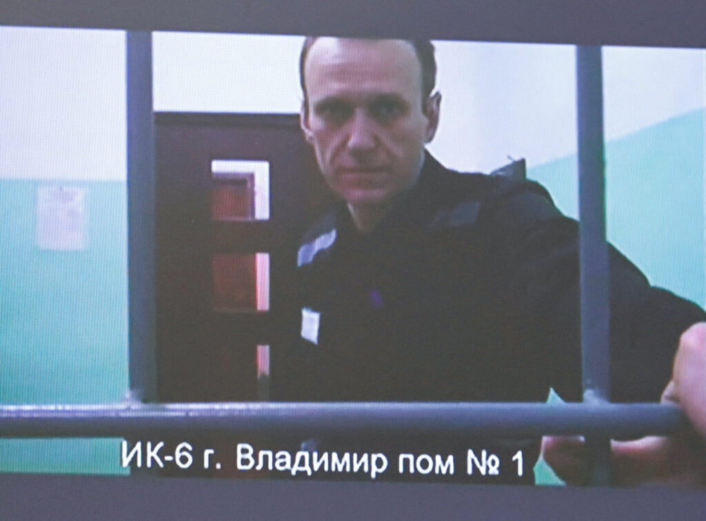 Russian opposition politician Alexei Navalny appears on a screen via video link from the IK-6 penal colony in the Vladimir region, during a court hearing to consider an appeal against his sentence in the criminal case on numerous charges, including the creation of an extremist organisation, in Moscow, Russia. on 26th September, 2023