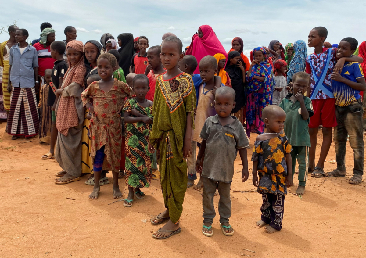 FILE PHOTO: Internally displaced Somali children gather outside their makeshift shelters at the Ladan camp for internally displaced people (IDP) in Dollow, Somalia May 1, 2023. REUTERS/Ayenat Mersie/File Photo