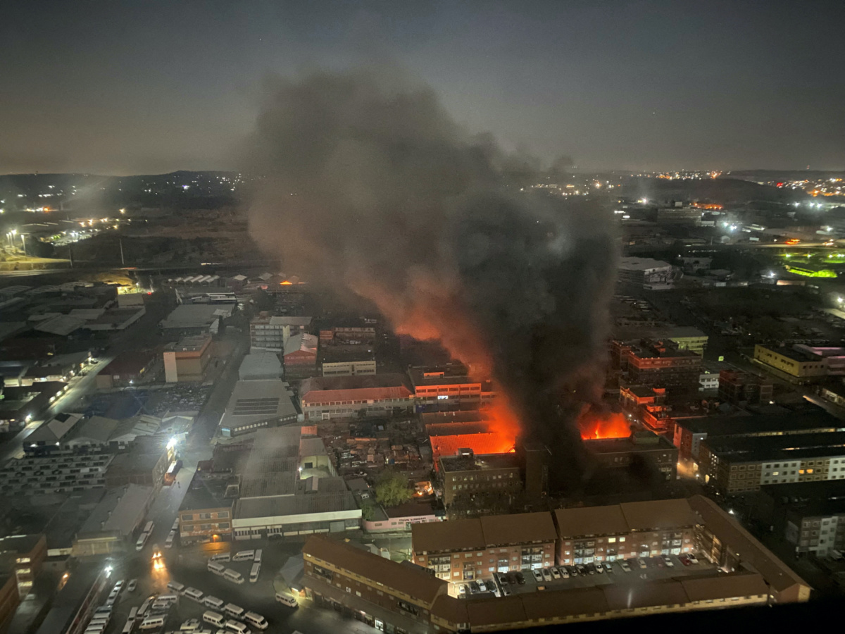 Smoke rises from a burning building amid a deadly fire, in Johannesburg, South Africa, August 31, 2023, in this image obtained from social media. X/@odirileram/via REUTERS
