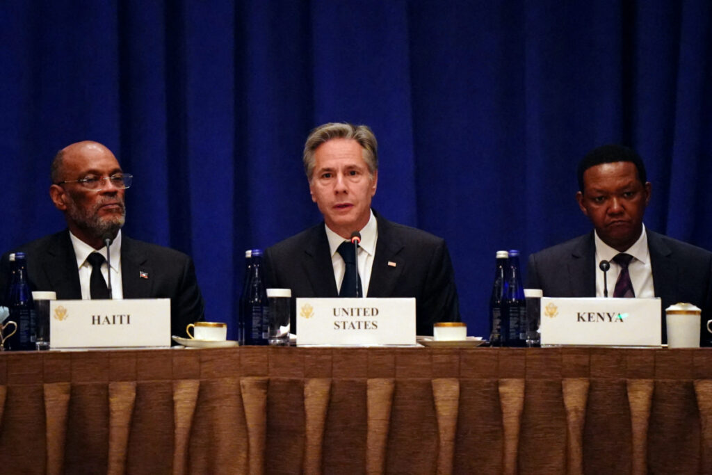 US Secretary of State Antony Blinken, flanked by Haitian Prime Minister Ariel Henry, left, and Kenyan Cabinet Secretary for Foreign and Diaspora Affairs Alfred Nganga Mutua, right, addresses diplomats and media during a meeting on the security situation in Haiti, on the sidelines of the 78th United Nations General Assembly at the Lotte Palace Hotel in New York City, US, on 22nd September, 2023