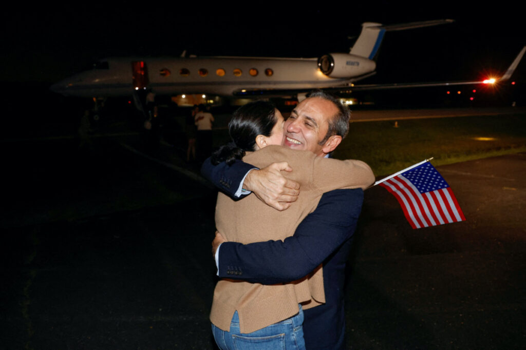Family members embrace freed American Emad Shargi after he and four fellow detainees were released in a prisoner swap deal between US and Iran, and arrived at Davison Army Airfield at Fort Belvoir, Virginia, US, on 19th September, 2023.