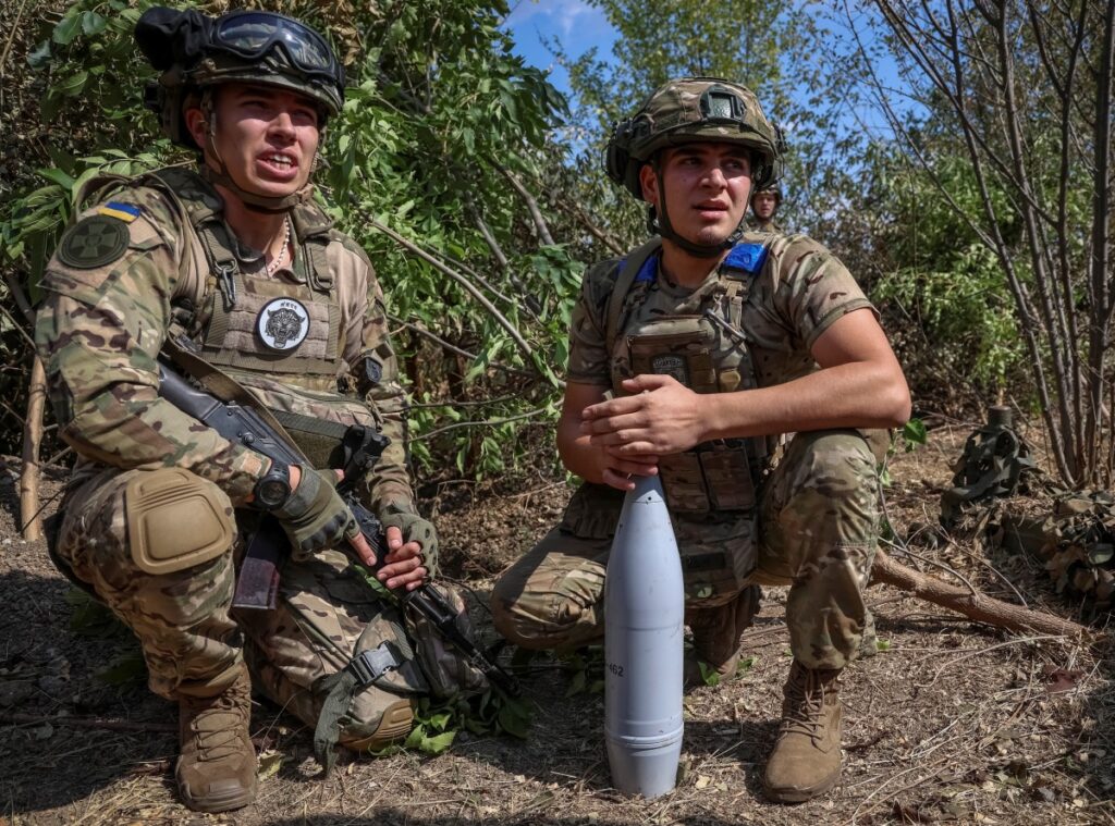 Ukrainian servicemen of the Spartan Brigade of the National Guard of Ukraine prepare a shell for a D-30 howitzer at a position at a front line, amid Russia's attack on Ukraine, in Zaporizhzhia region, Ukraine, on 13th September, 2023