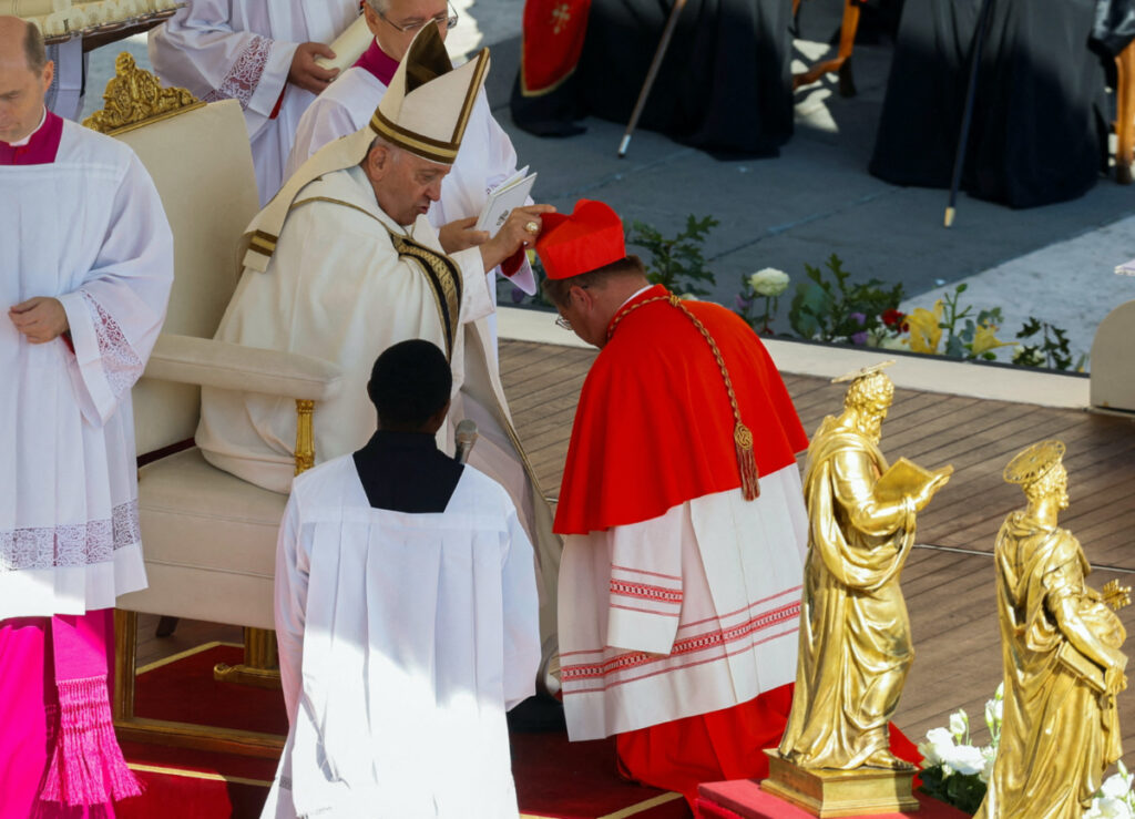 Pope Francis blesses new Cardinal Grzegorz Rys, during a consistory ceremony to elevate Roman Catholic prelates to the rank of cardinal, in Saint Peter's square at the Vatican, on 30th September, 2023
