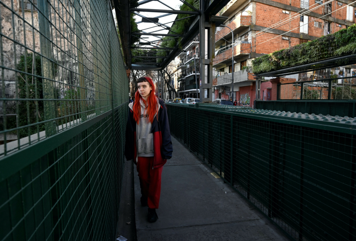 Rocio Pozzetti, 16, walks after school and before going to theatre classes, in Buenos Aires, Argentina, on 4th August, 2023