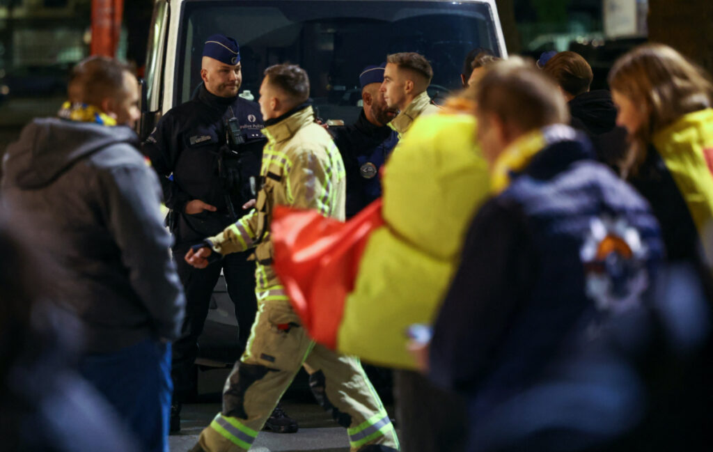 Police officers secure the area outside the King Baudouin Stadium after a shooting in Brussels, Belgium, on 16th October, 2023