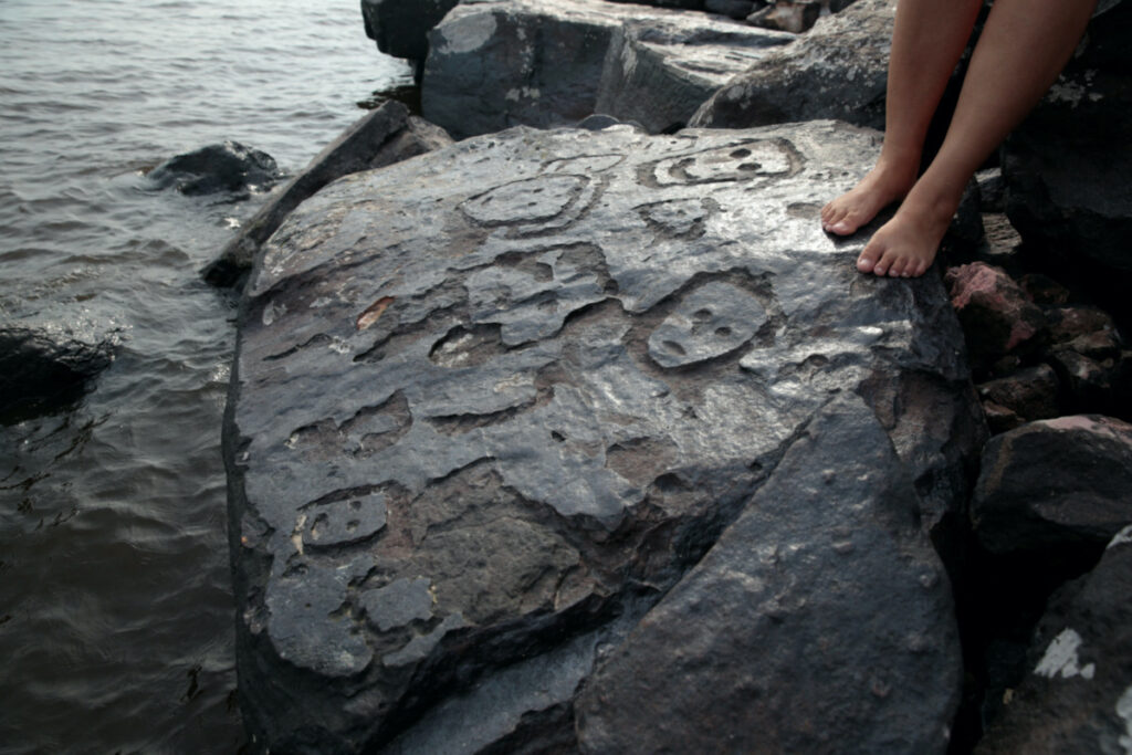 A view of ancient stone carvings on a rocky point of the Amazon river that were exposed after water levels dropped to record lows during a drought in Manaus, Amazonas state, Brazil on 23rd October, 2023