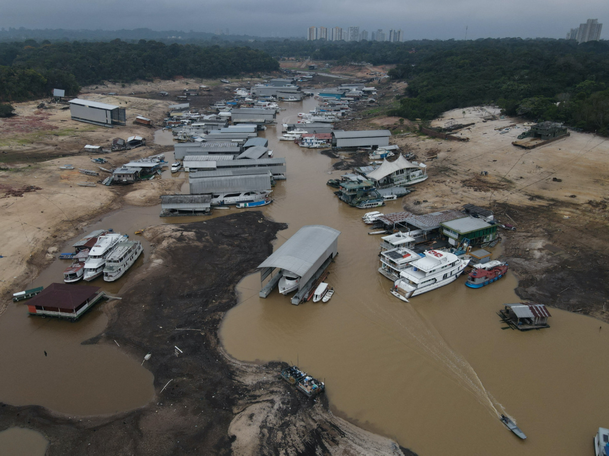 Boats and houseboats are seen stranded at David's Marina, as the water level at a major river port in Brazil's Amazon rainforest hit its lowest point in at least 121 years on Monday, at the Rio Negro river in Manaus, Brazil, on 16th October, 2023