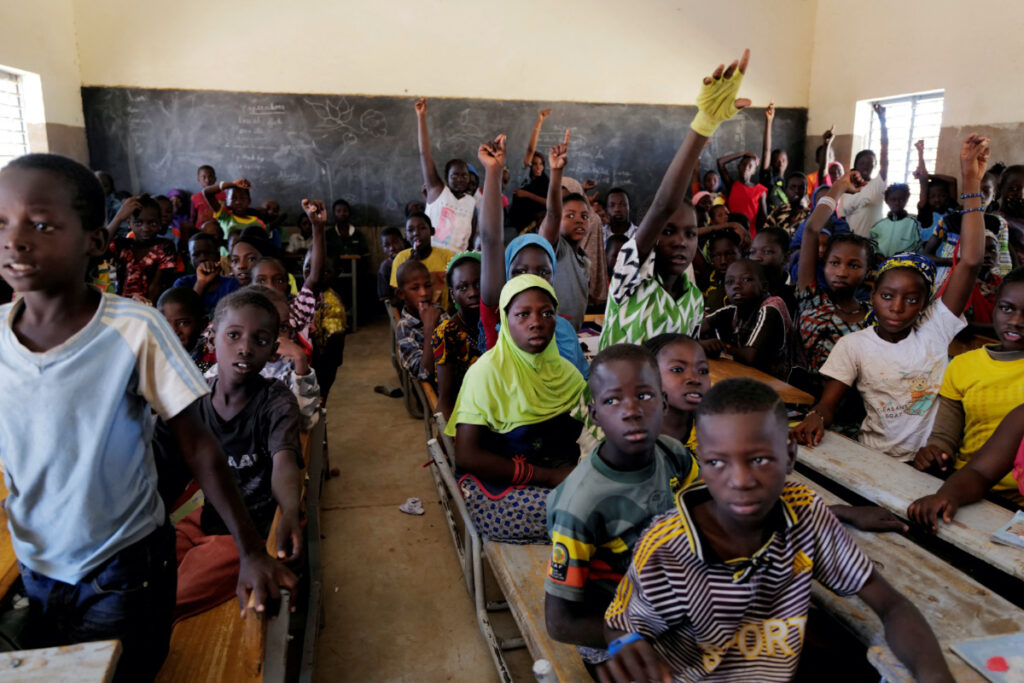 Schoolchildren who fled from attacks of armed militants in Sahel region attend a class in Dori, Burkina Faso, on 24th November, 2020