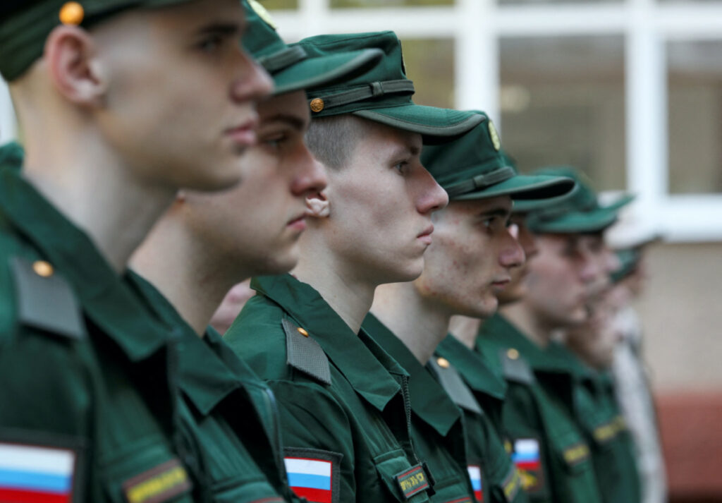 Russian conscripts called up for military service line up before their departure for garrisons as they gather at a recruitment centre in Simferopol, Crimea, on 25th April, 2023