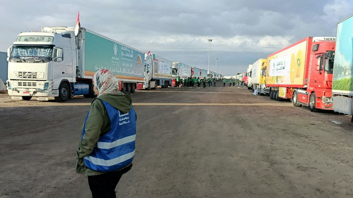 Trucks carrying humanitarian aid from Egyptian NGOs for Palestinians, wait for the reopening of the Rafah crossing at the Egyptian side, to enter Gaza, amid the ongoing conflict between Israel and the Palestinian Islamist group Hamas, in Rafah, Egypt on 17th October, 2023