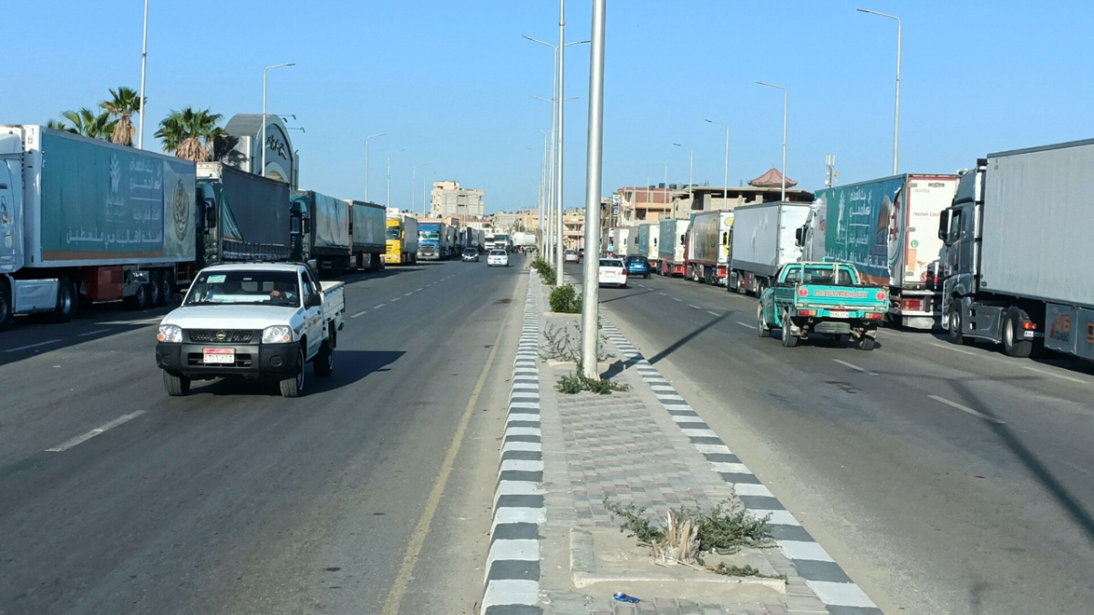 A view of trucks of Egyptian NGOs, carrying humanitarian aid to Palestinians, as they wait for an agreement on the Rafah border crossing to enter Gaza, amid the ongoing conflict between Israel and the Palestinian Islamist group Hamas, in the city of Al-Arish in Egypt's Sinai peninsula, Egypt, on 15th October 2023.