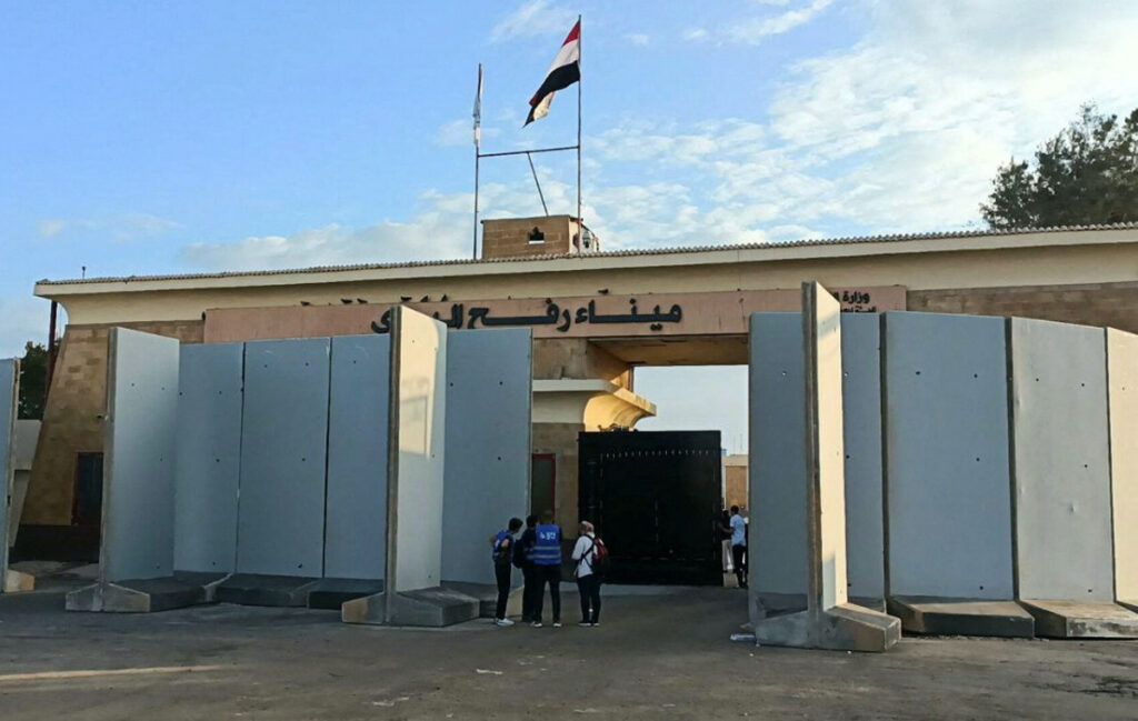 Egyptian volunteers wait at the Rafah crossing in Egypt, on 17th October, 2023.