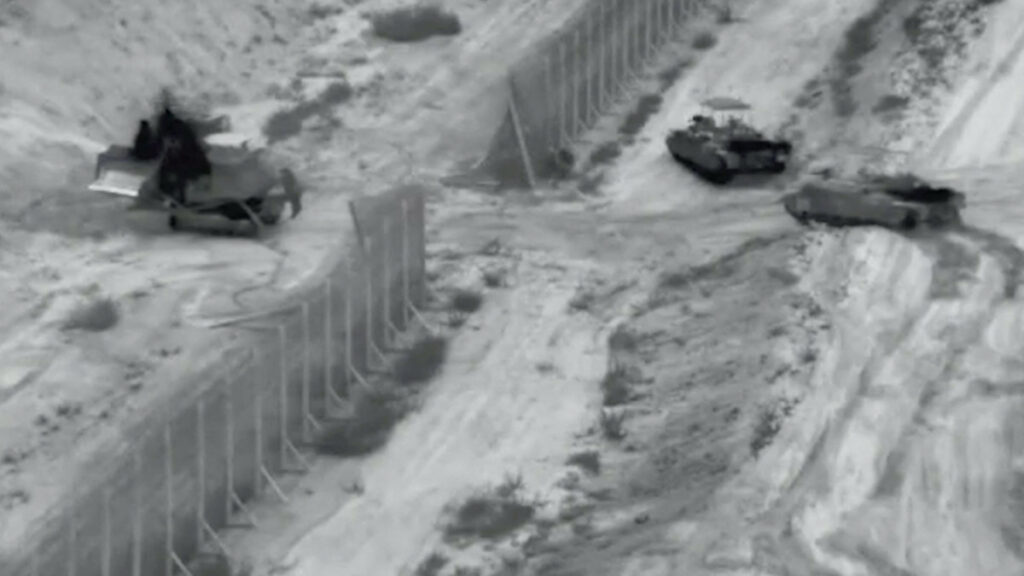 Israeli armoured vehicles take part in an operation, as the conflict between Israel and Hamas continues, at a location given as the northern Gaza Strip in this still image taken from handout video released on 26th October, 2023.