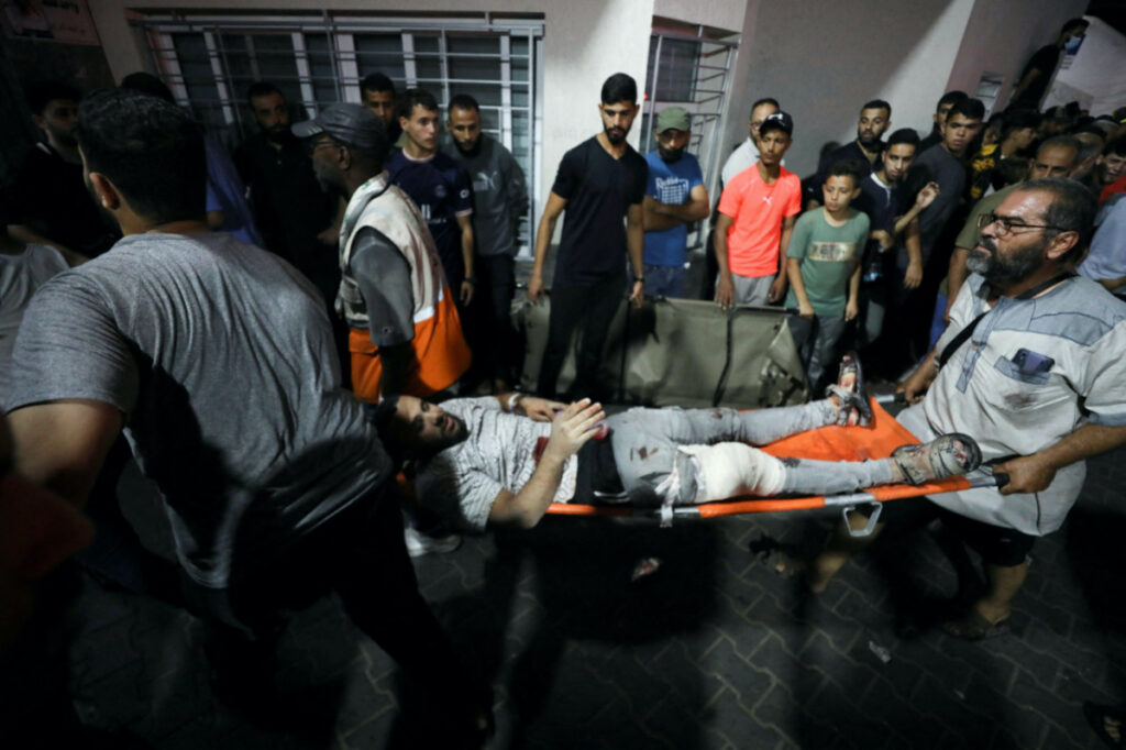 An injured person is assisted at Shifa Hospital after an Israeli air strike hit the nearby Al-Ahli Hospital, according to Gaza Health Ministry in Gaza City, Gaza Strip, on 17th October, 2023