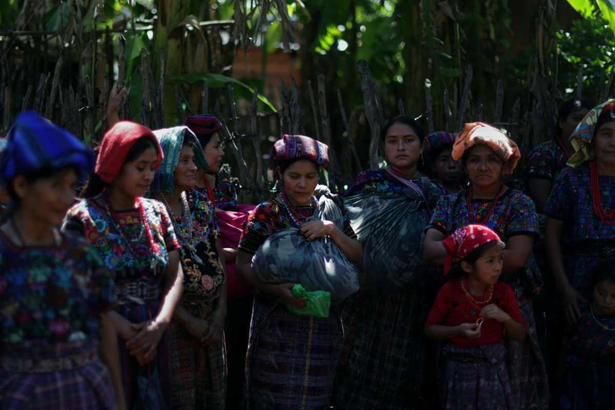 Indigenous women gather on the river bank in El Aguacate village in Baja Verapaz, Guatemala, on 16th August, 2023.