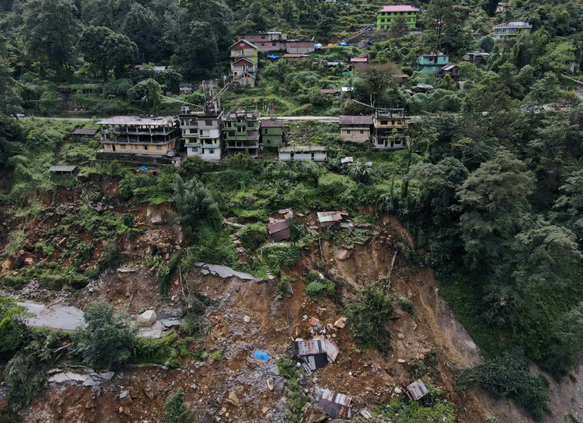 A drone view of damaged roads and houses that were washed away by flash floods in Naga-Namgor village, Sikkim, India, on 10th October, 2023