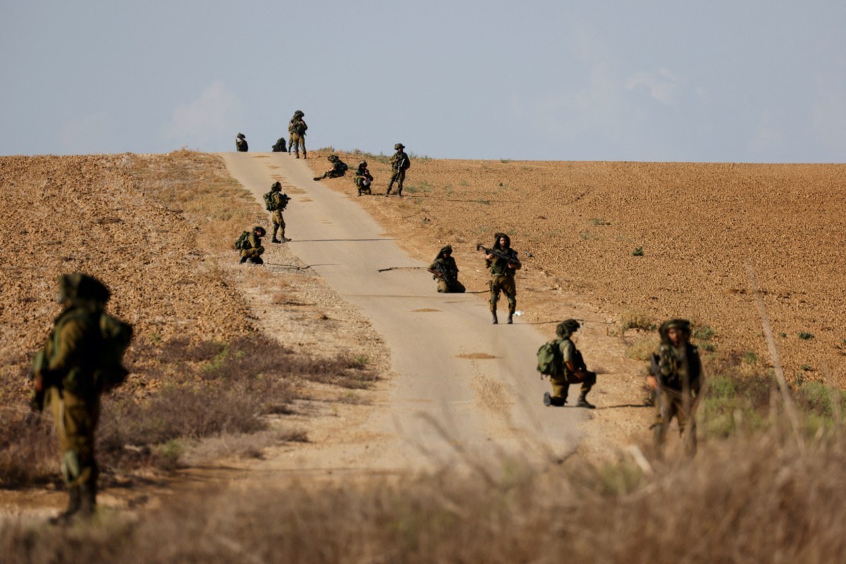 Israeli soldiers patrol an area near Israel's border with the Gaza Strip, in southern Israel , on 19th October, 2023