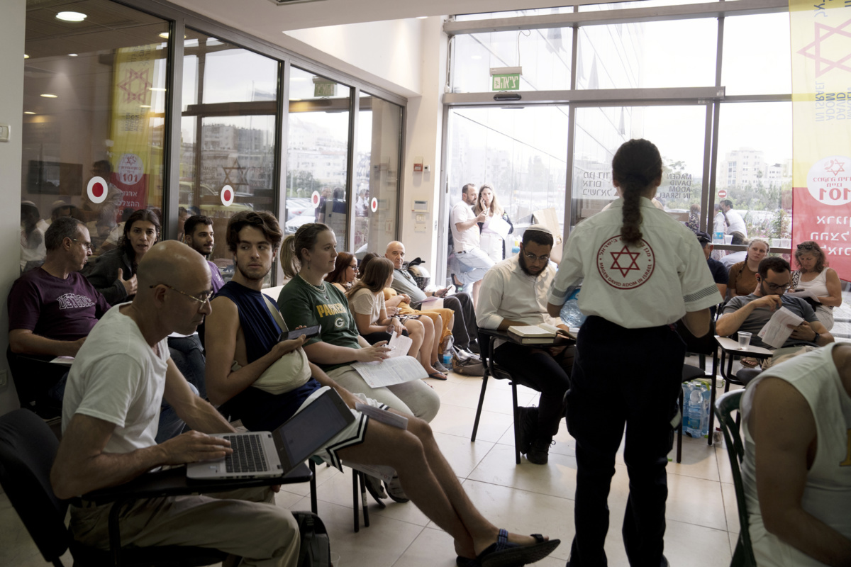 Israelis wait to donate blood at Magen David Adom emergency service in Jerusalem, following an attack by Hamas militants on Israel, on Saturday, 7th October, 2023