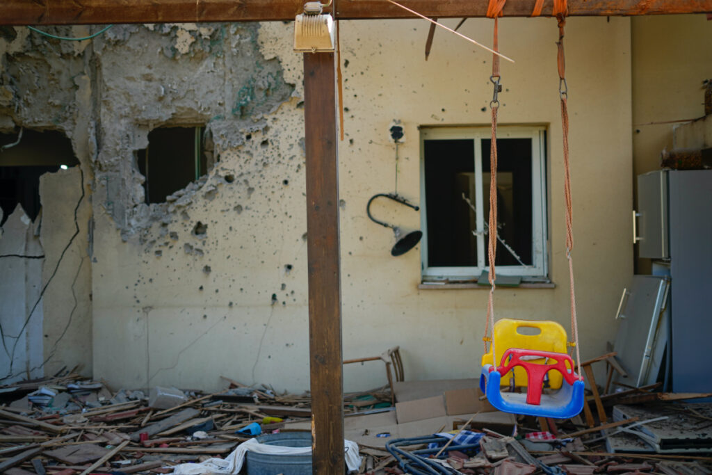 A children's swing hangs in a house damaged by Hamas militants is seen in Kibbutz Be'eri, Israel, Saturday, on 14th October, 2023