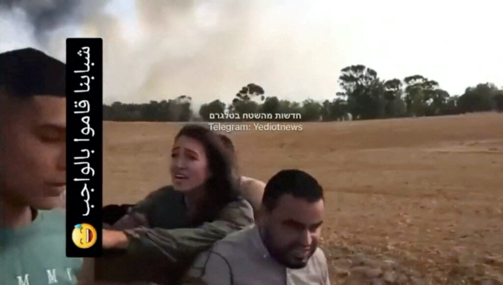 A screengrab from a social media video published on 7th October, 2023 shows Noa Argamani as she is taken hostage by Palestinian militants, at an unknown location.