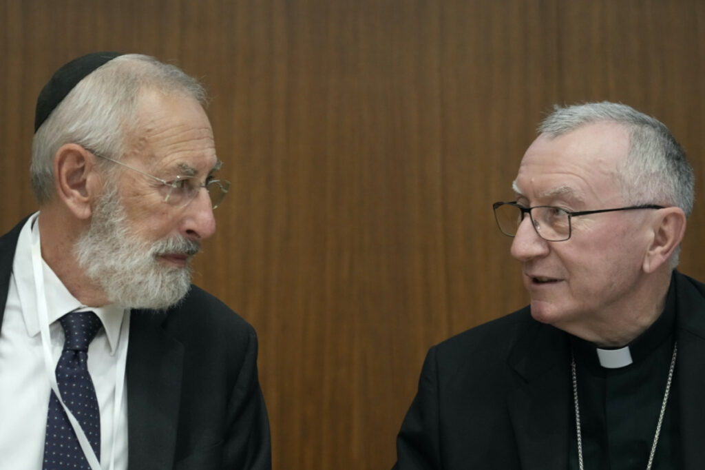 Rome's Chief Rabbi Riccardo Di Segni, left, talks to Vatican Secretary of State Pietro Parolin during the international conference "New documents from the Pontificate of Pope Pius XII and their Meaning for Jewish-Christian Relations: A Dialogue Between Historians and Theologians", at the Gregorian University in Rome, Monday, 9th October, 2023