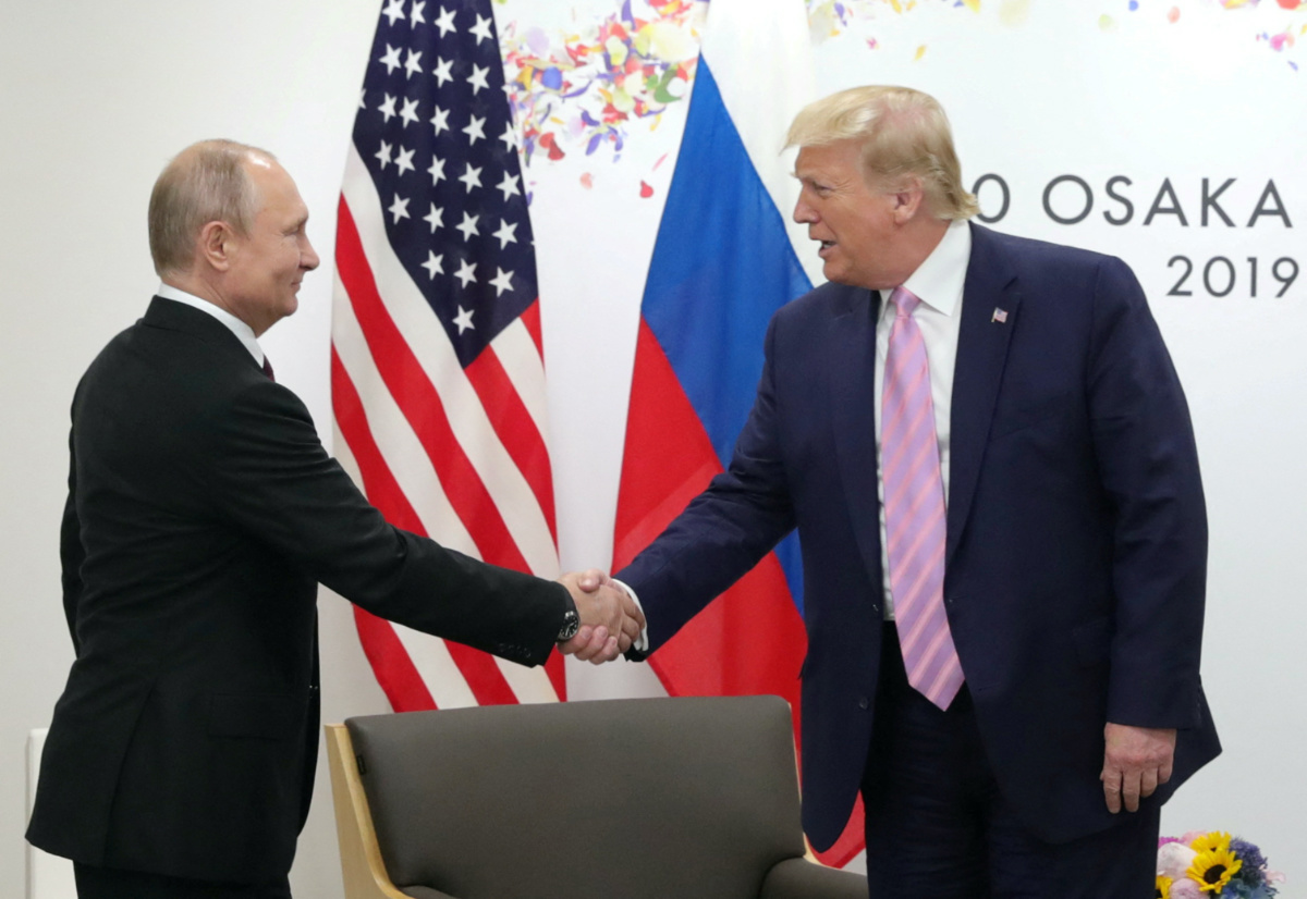 Russia's President Vladimir Putin shakes hands with US President Donald Trump during a meeting on the sidelines of the G20 summit in Osaka, Japan on 28th June, 2019