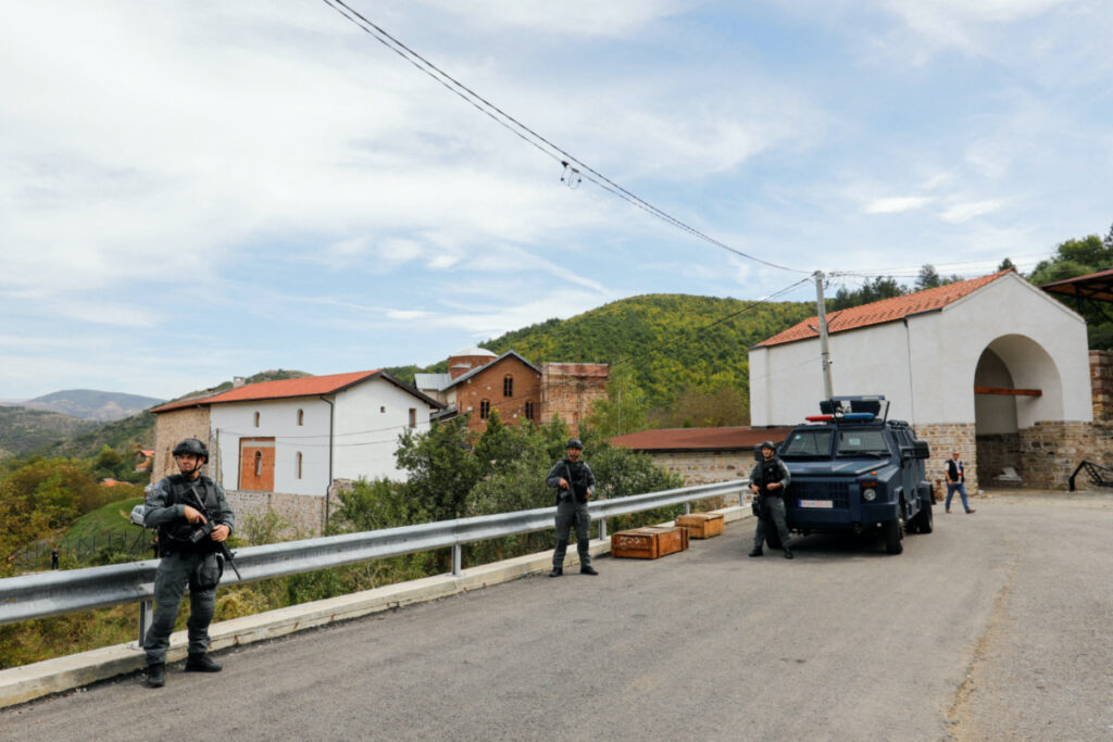 Kosovo police officers patrol, in the aftermath of a shooting incident, in Banjska village, Kosovo, on 27th September, 2023.