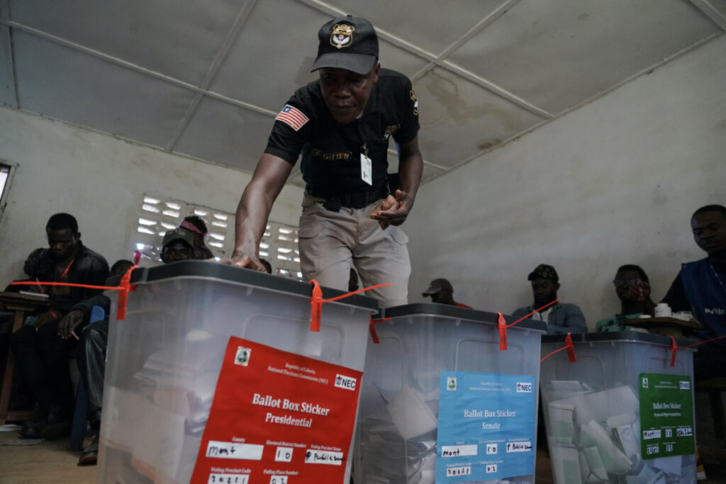 A security officer checkes ballot boxes during Liberia's presidential election in Monrovia, Liberia, on 10th October, 2023